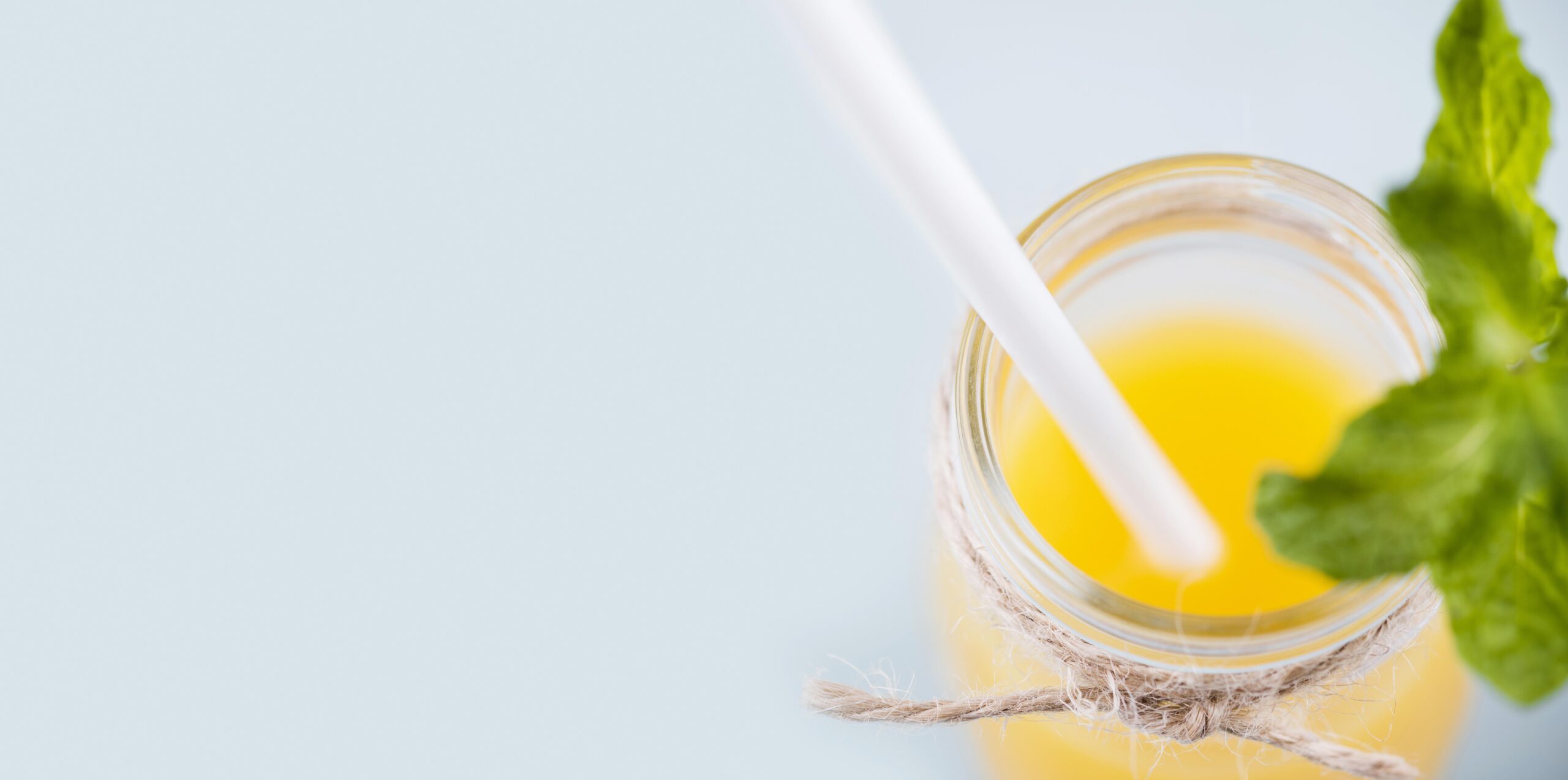 delicious homemade lemonade with straw scaled